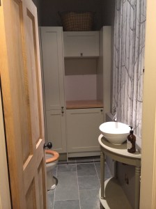 Door and cupboard sorted, complete with handy and totally unplanned baby changing area