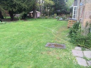 One ugly drain cover and blank canvas